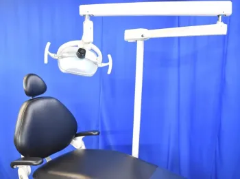 A-dec 1021 Decade Dental Examination Chair with A-dec 6300 Post Mounted Lighting